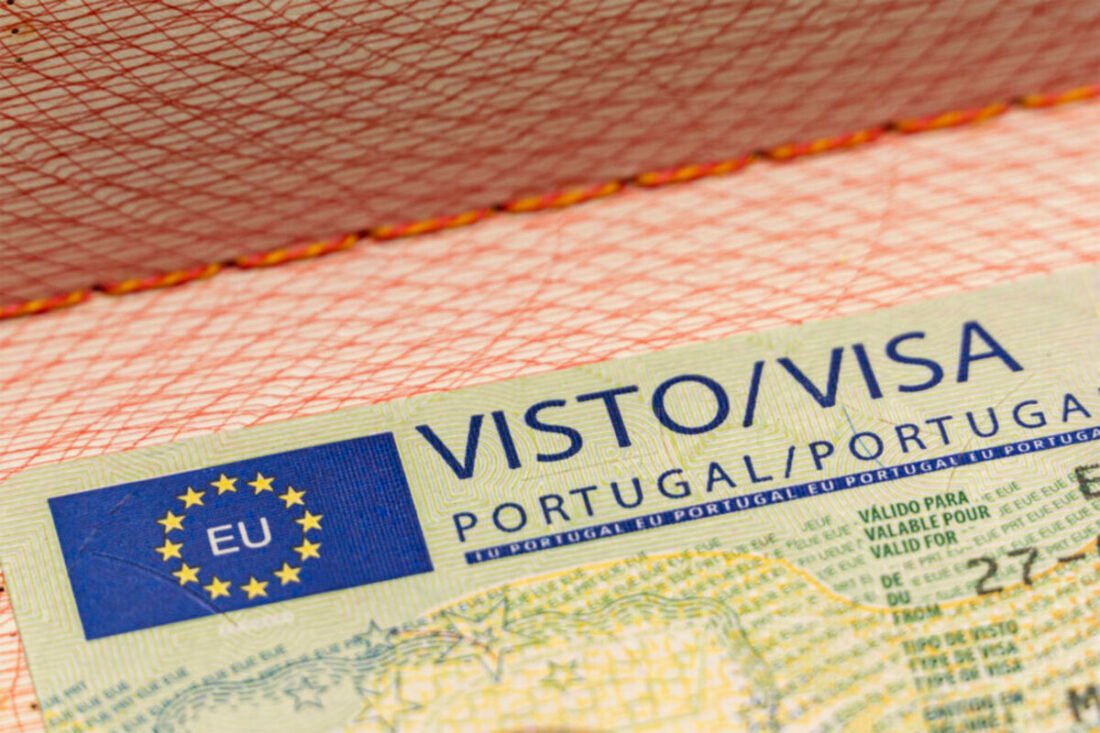 a close up of a passport Visto CPLP